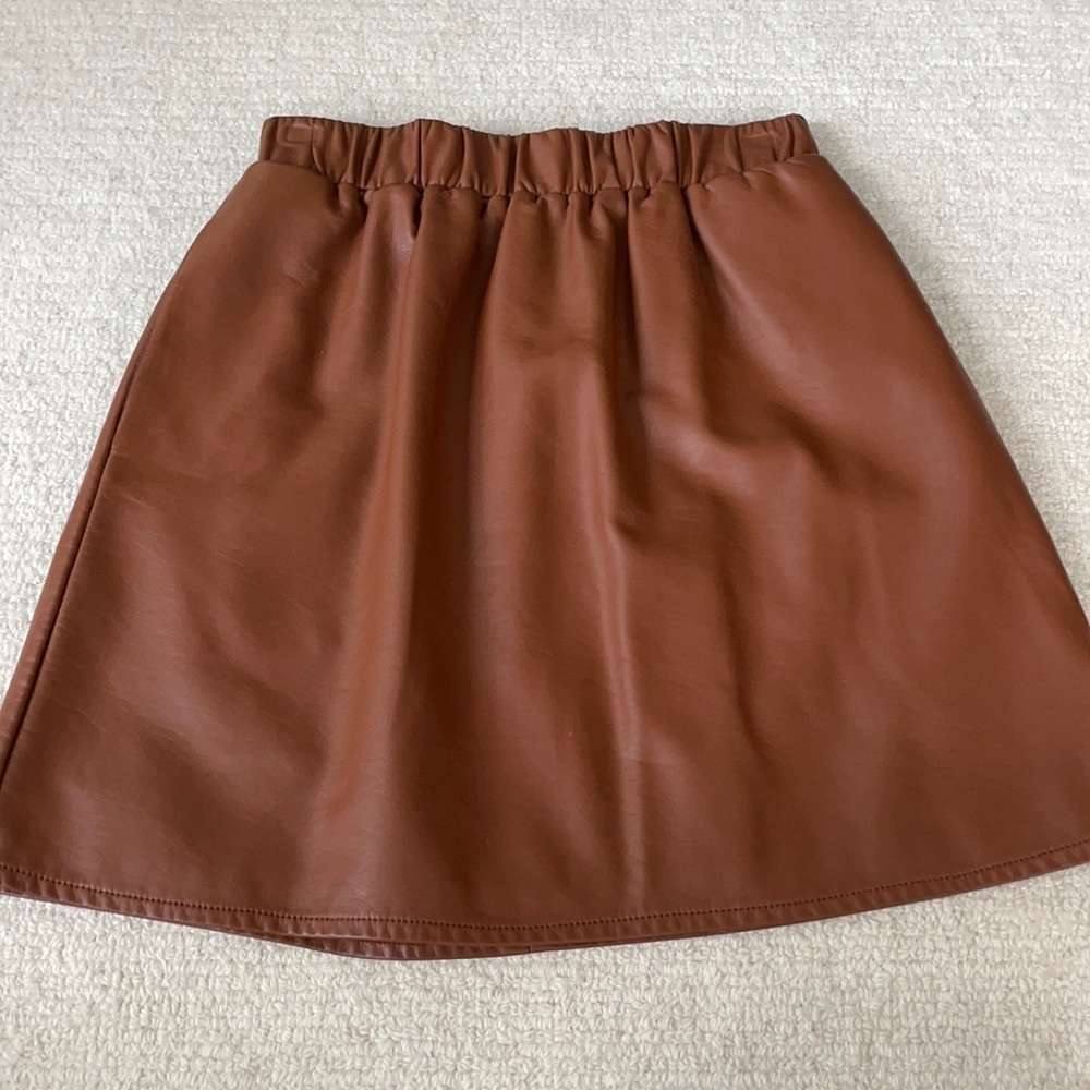 Adorable vegan leather skirt. Size S. Like New. Has pockets!
